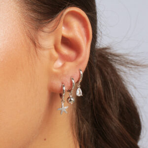 Trio de argolinhas com pingentes bola gota e estrela banhado em ouro branco